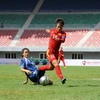 Đội tuyển nữ Việt Nam (áo đỏ) ​trong một trận đấu với Philippines. (Nguồn: MMF)