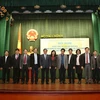 Lãnh đạo Bộ Tài chính và năm cơ quan báo chí Trung ương tại hội nghị. (Ảnh: Phạm Hậu/TTXVN)