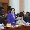 Bộ trưởng Bộ Y tế Nguyễn Thị Kim Tiến trình bày báo cáo tại phiên giải trình. (Ảnh: Phương Hoa/TTXVN)
