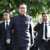 Thủ tướng Thái Lan Prayut Chan-o-cha (giữa) tới tham dự cuộc họp nội các ở thủ đô Bangkok. (Nguồn: EPA/TTXVN)