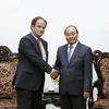 Thủ tướng Nguyễn Xuân Phúc tiếp Tổng Thư ký Tòa Trọng tài thường trực Hugo Hans Siblesz. (Ảnh: Văn Điệp/TTXVN)