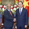 Chủ tịch nước Trần Đại Quang tiếp Bộ trưởng Bộ Tài nguyên và Môi trường Singapore Masagos Zulkifli. (Ảnh: Nhan Sáng/TTXVN)