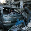Cảnh đổ nát sau các cuộc giao tranh giữa quân đội chính phủ và phiến quân tại thành phố Aleppo, miền Nam Syria. (Nguồn: AFP/TTXVN)