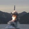 Tên lửa đạn đạo được phóng lên từ tàu ngầm tại một vị trí bí mật ở Triều Tiên. (Nguồn: EPA/TTXVN)
