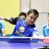 Tay vợt Trần Tuấn Quỳnh (Hà Nội T&T) thi đấu vòng loại nội dung đồng đội nam. (Ảnh: Quốc Khánh/TTXVN)