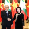 Chủ tịch Quốc hội Nguyễn Thị Kim Ngân đón Chủ tịch Thượng viện Myanmar Mahn Win Khaing Than. (Ảnh: Trọng Đức/TTXVN)