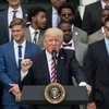 Tổng thống Mỹ Donald Trump (giữa) trong bài phát biểu tại thủ đô Washington. (Nguồn: AFP/TTXVN)