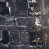 Tòa nhà chung cư Grenfell Tower bị thiêu rụi sau vụ hỏa hoạn. (Nguồn: AFP/TTXVN)
