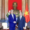 Chủ tịch nước Trần Đại Quang tiếp cựu Bộ trưởng Ngoại giao Hoa Kỳ John Kerry. (Ảnh: Nhan Sáng/TTXVN)