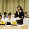 Phó Thống đốc Ngân hàng Nhà nước Nguyễn Thị Hồng trả lời các câu hỏi của phóng viên báo chí. (Ảnh: Văn Điệp/TTXVN)