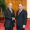 Thủ tướng Nguyễn Xuân Phúc tiếp Phó Chủ tịch thứ nhất Thượng viện Vương quốc Campuchia Nay Pena. (Ảnh: Thống Nhất/TTXVN)