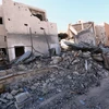 Cảnh đổ nát do xung đột ở thành phố Sirte, phía đông Tripoli. (Nguồn: AFP/TTXVN)