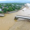 Cầu Thia tại huyện Trạm Tấu bị lũ cuốn trôi ngày 11/10. (Ảnh: Tuấn Anh/Vietnam+)