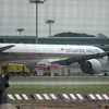 Máy bay Boeing 777-300ER của Hãng hàng không Singapore Airlines tại sân bay quốc tế Changi. (Nguồn: AFP/TTXVN)