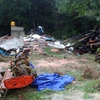 Căn nhà tại thôn Long Lanh, xã Đạ Chais, huyện Lạc Dương, Lâm Đồng, bị lũ cuốn đổ sập, đè chết 2 người phụ nữ. (Ảnh : Chu Quốc Hùng-Đặng Anh Tuấn/TTXVN)