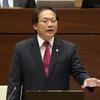 Bộ trưởng Bộ Thông tin và Truyền thông Trương Minh Tuấn trả lời chất vấn của đại biểu Quốc hội. (Ảnh: Phương Hoa/TTXVN)