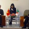 Bộ trưởng Bộ Xây dựng Phạm Hồng Hà gặp gỡ, làm việc với Bộ trưởng Bộ Công nghiệp và Mỏ Algeria Youcef Yousfi . (Ảnh: Quang Trường/TTXVN) 