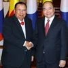 Thủ tướng Nguyễn Xuân Phúc hội kiến với Tổng Bí thư, Chủ tịch nước Lào Bounnhang Vorachith. (Ảnh: Thống Nhất/TTXVN) 