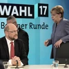 Thủ tướng Đức Angela Merkel (phải) và Chủ tịch SPD Martin Schulz (trái) tại một sự kiện ở Berlin. (Nguồn: AFP/TTXVN