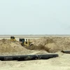Các đường ống dẫn dầu tại mỏ dầu Majnoon, Iraq. (Nguồn: AFP/TTXVN)