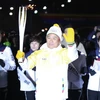 Ông Lee Kee-heung, Chủ tịch Ủy ban Olympic và Thể thao Hàn Quốc tham gia hành trình rước đuốc Olympic mùa Đông Pyeogchang 2018, tại Khu liên họp thể thao Jamsil, Đông Nam Seoul. (Nguồn: Yonhap/TTXVN)