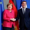 Thủ tướng Đức Angela Merkel và Tổng thống Pháp Emmanuel Macron. (Nguồn: Reuters) 