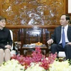Chủ tịch nước Trần Đại Quang tiếp bà Catherine Wong Siow Ping, Đại sứ Singapore tại Việt Nam. (Ảnh: Nhan Sáng/TTXVN)