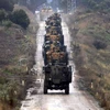 Đoàn xe quân sự Thổ Nhĩ Kỳ tập kết tại Hassa, tiến về biên giới Syria. (Nguồn: AFP/TTXVN)