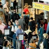 Hành khách xếp hàng tại cửa kiểm tra an ninh ở sân bay quốc tế Baltimore/Washington, Mỹ. (Nguồn: AFP/TTXVN)