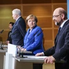 Liên minh CDU/CSU của Thủ tướng Đức Angela Merkel (giữa) và đảng SPD đã đạt thỏa thuận quan trọng về chính sách nhập cư. (Nguồn: THX/TTXVN)