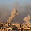 Khói bốc lên từ khu vực Arbin, ngoại ô Damascus, Syria. (Nguồn: AFP/TTXVN)