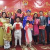 Đại sứ Phạm Anh Tuấn đón Tết cùng cộng đồng người Việt Nam tại Nigeria. (Ảnh: Dư Hưng/Vietnam+)