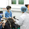 Một ca phẫu thuật nội soi thực hiện tại Trung tâm kỹ thuật cao và tiêu hóa Hà Nội. (Ảnh: Dương Ngọc/TTXVN)