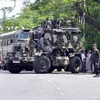 Cảnh sát tuần tra tại Pallekele, huyện Kandy, Sri Lanka. (Nguồn: AFP/TTXVN)