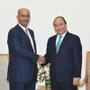 Thủ tướng Nguyễn Xuân Phúc tiếp Bộ trưởng Thương mại và Công nghiệp Oman Ali bin Masoud Al Sunaidy. (Ảnh: Thống Nhất/TTXVN)