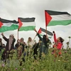 Người biểu tình tham gia buổi cầu nguyện ngày Thứ sáu tại Dải Gaza ngày 30/3. (Nguồn: AFP/TTXVN)