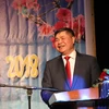 Đại sứ Việt Nam tại Đức Đoàn Xuân Hưng phát biểu khai mạc cuộc gặp. (Ảnh: Anh Đức/Vietnam+)