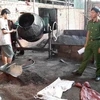Chế biến càphê bẩn tại cơ sở của bà Nguyễn Thị Thanh Loan. (Ảnh: TTXVN phát)