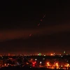 Tên lửa đất đối không của Syria bắn hạ các tên lửa do liên quân Mỹ-Anh-Pháp phóng xuống Damascus rạng sáng 14/4. (Nguồn: THX/TTXVN)