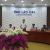 Chánh Văn Phòng Ủy ban Nhân dân tỉnh Lào Cai Vương Trinh Quốc chủ trì họp báo. (Ảnh: Hương Thu/TTXVN)