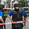Cảnh sát Thụy Sĩ thực hiện nhiệm vụ thị trấn Schaffhausen. (Nguồn: AFP/TTXVN)