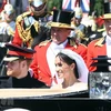 Hoàng tử Harry và Công nương Meghan diễu hành qua thị trấn Windsor. (Nguồn: THX/TTXVN)