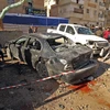 Hiện trường một vụ đánh bom ở Benghazi, Libya. (Nguồn: AFP/TTXVN)