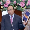 Thủ tướng Nguyễn Xuân Phúc phát biểu tại buổi gặp mặt. (Ảnh: Thống Nhất/TTXVN) 