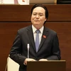 Bộ trưởng Bộ Giáo dục và Đào tạo Phùng Xuân Nhạ trả lời chất vấn của Đại biểu Quốc hội. (Ảnh: Phương Hoa/TTXVN)