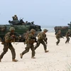 Binh sỹ Mỹ tham gia cuộc tập trận của NATO ở Nemirseta, Lithuania. (Ảnh: AFP/TTXVN)