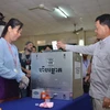 Cử tri Campuchia tham gia bỏ phiếu bầu cử Hội đồng xã, phường. (Ảnh: Phan Minh Hưng/TTXVN)
