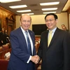 Phó Thủ tướng Chính phủ Vương Đình Huệ gặp, làm việc với Bộ trưởng Thương mại Hoa Kỳ Wilbur Ross. (Ảnh: TTXVN phát)