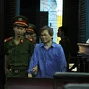 Bị cáo Lê Thành Công tại phiên tòa xét xử sơ thẩm vụ án thất thoát 966 tỷ đồng tại Ngân hàng Agribank Chi nhánh 6. (Ảnh: Hoàng Hải/TTXVN)