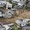 Nhiều ngôi nhà bị ngập trong nước sau những trận mưa lớn tại Kure, tỉnh Hiroshima. (Nguồn: Kyodo/TTXVN)